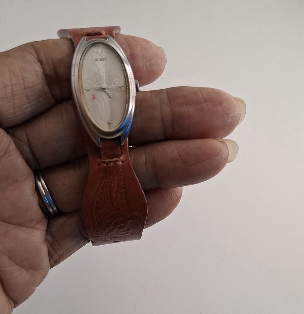 Vintage GUESS Womens Oval Watch Silver Tone Embossed Watch
